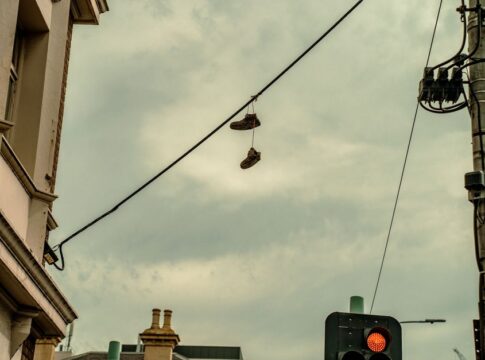 What Causes Shoes Hanging on Power Lines: 9 Theories — General trivia by TrivBits