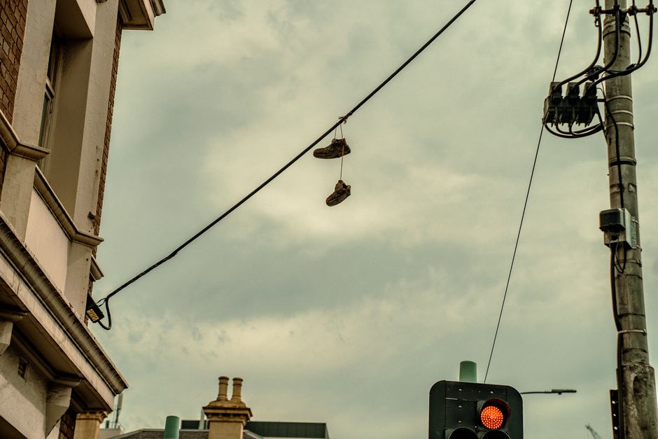 What Causes Shoes Hanging on Power Lines: 9 Theories — General trivia by TrivBits